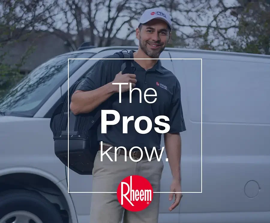 Rheem Pro partner, technician posing by his truck, getting ready to go help a customer with their heating or cooling system maintenance - Vandalia, IL